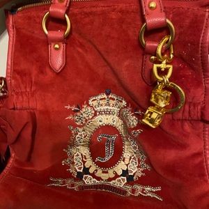 Wore it twice, like new, with rhinestone key chain and Rhine stones